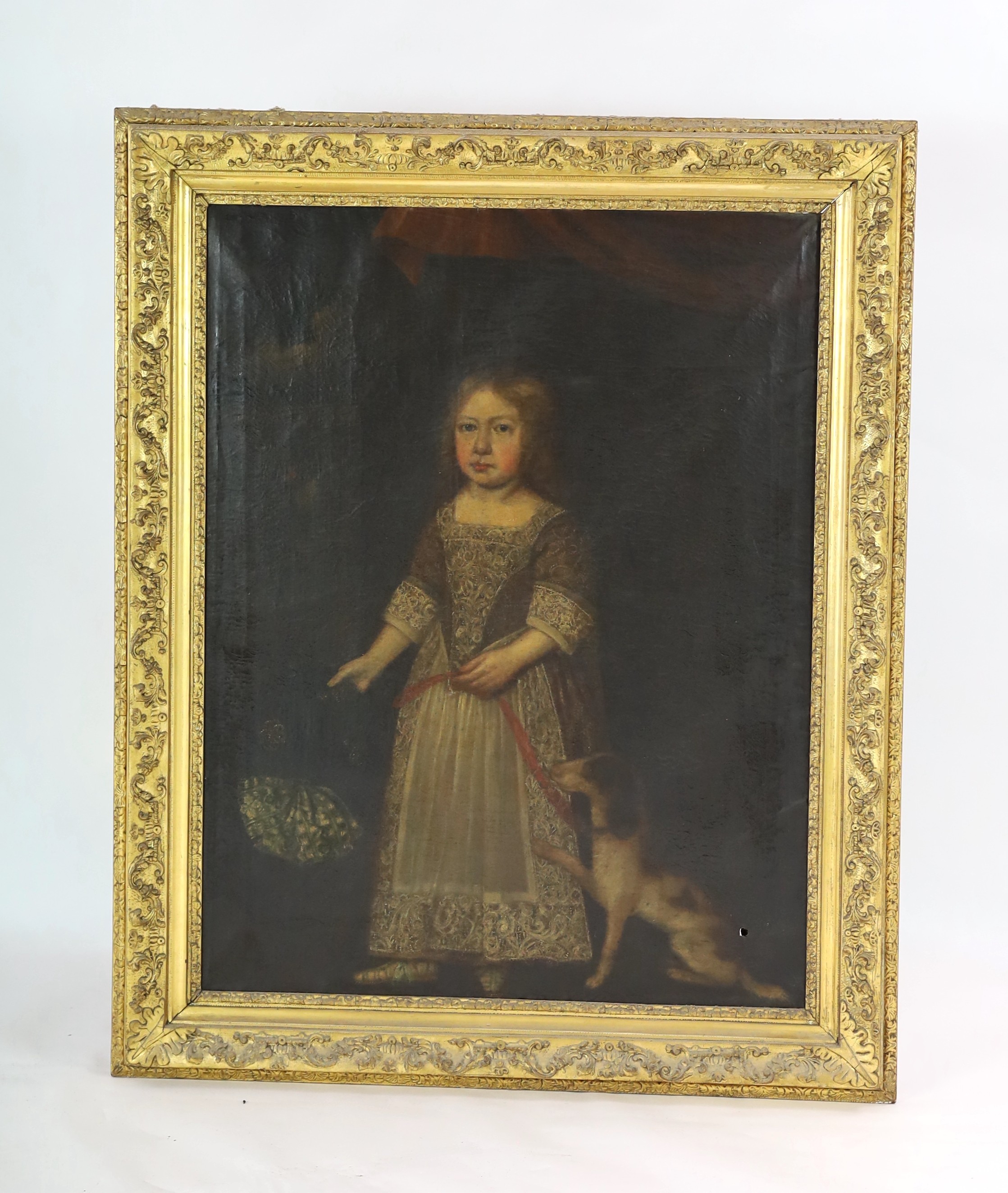 Late 17th century English School, Full length portrait of a child standing beneath a canopy with a dog at their feet and holding an elaborate hat, oil on canvas, 111 x 85cm